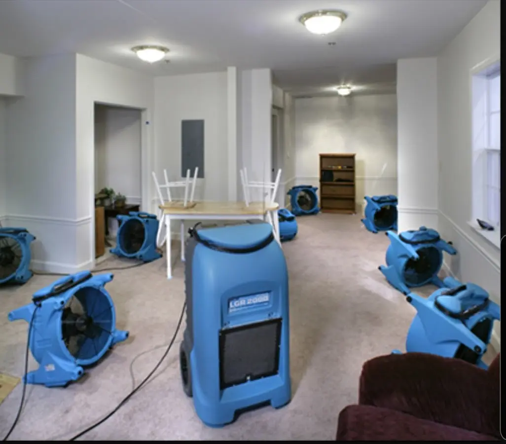 Air movers and dehumidifier setup for Water Damage Restoration in Hopkinton